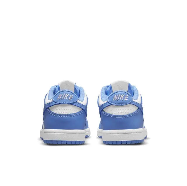 Back view of low-top sneakers with Nike heel tab and blue ankle panels