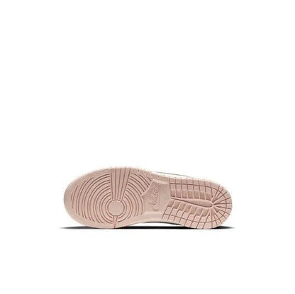 Light pink Nike SB Dunk Low outsole with rubber tread pattern on the underside.