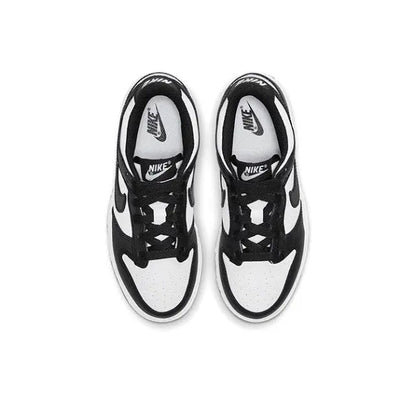 Low-top skate sneakers top view, black laces with white panel and Swoosh branding