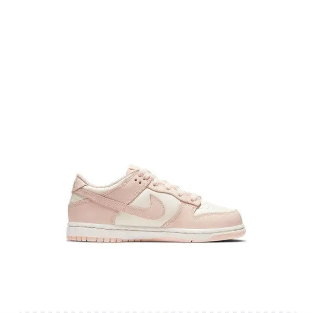 Light pink Nike SB Dunk Low low-top sneakers with white panels and pink overlays.