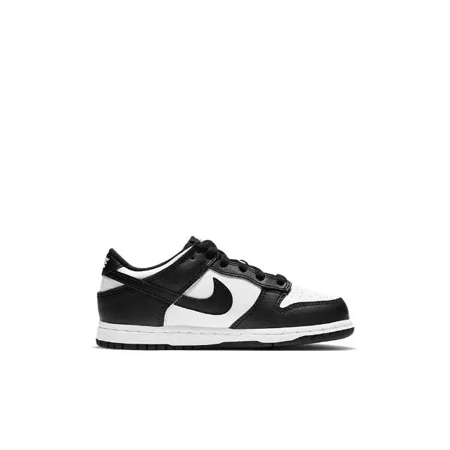 Low-top skate sneaker side view, black and white panels with Swoosh and laces