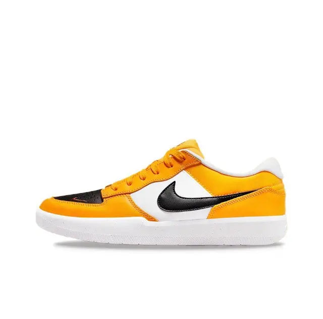 Low-top sneakers in orange, black, and white with Swoosh logo and white sole