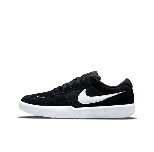 Black low-top skate shoes with white Swoosh and white midsole