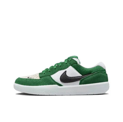 Green and white low-top sneakers with black Swoosh and white rubber sole