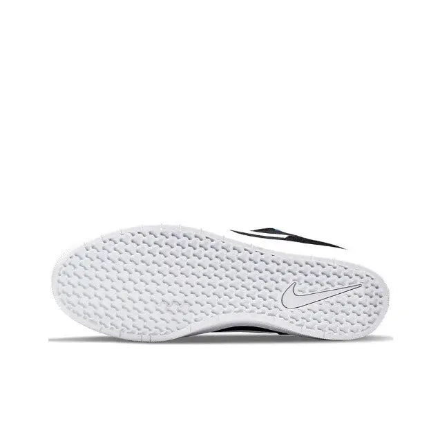 Shoe outsole with white rubber tread and black stripe detail