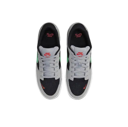 Nike SB Force 58 skate shoe pair view, grey uppers with black overlays and green swoosh
