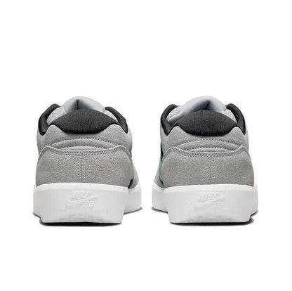 Nike SB Force 58 skate shoe heel view, grey upper with black collar and white sole