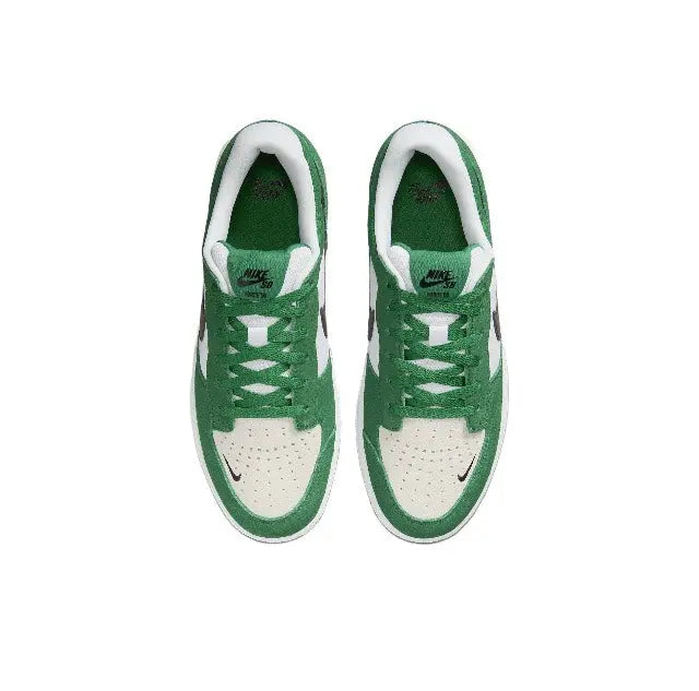Green and white lace-up sneakers with black and white lace eyelets
