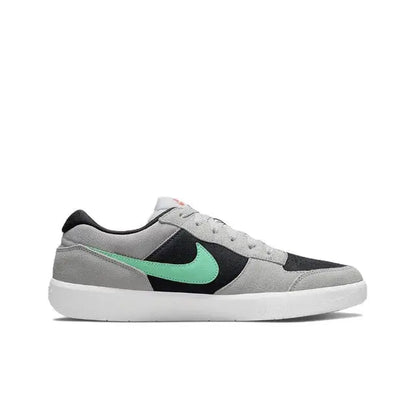 Nike SB Force 58 side view, grey upper with black-and-green Nike swoosh and white sole