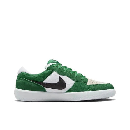 Green and white low-top sneakers with black Swoosh and white rubber sole