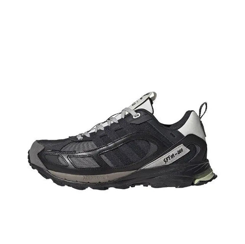 Men's trail-style sneaker in dark black, with gray overlays and white laces