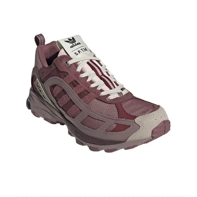 Adidas low-top sneaker in maroon and gray with white laces and text on tongue