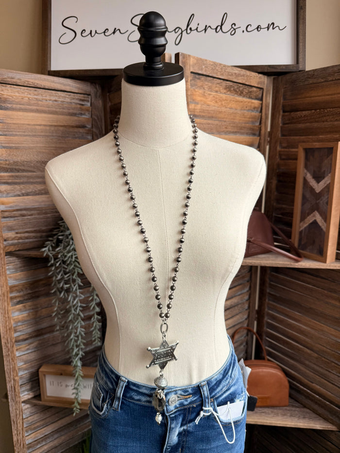 Silver sheriff star pendant necklace with faceted crystal and bead chain