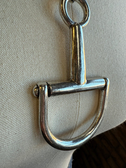 Silver snaffle bit pendant with small side detail on chain necklace