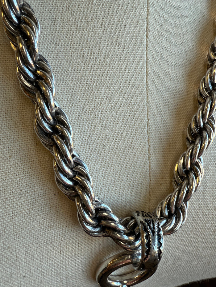 Silver braided chain necklace with chunky linked chain and small clasp detail
