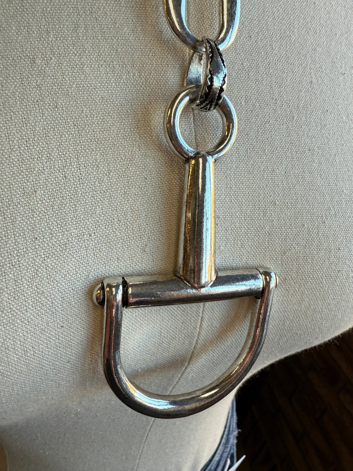 Silver-tone bit charm pendant with curved U loop on an oval link chain