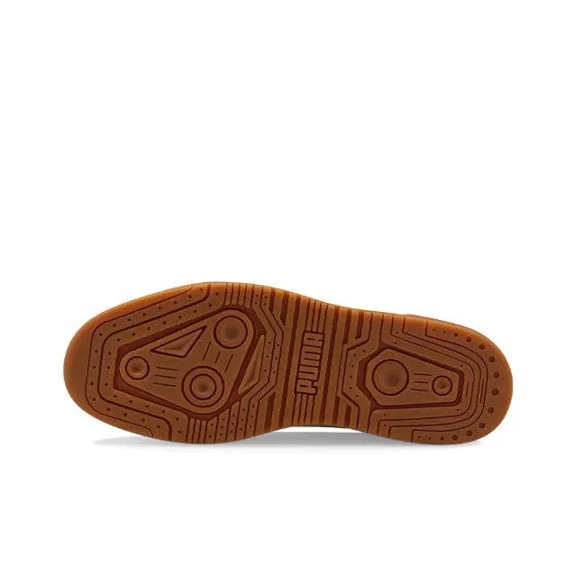 Gum rubber outsole with Puma logo traction pattern