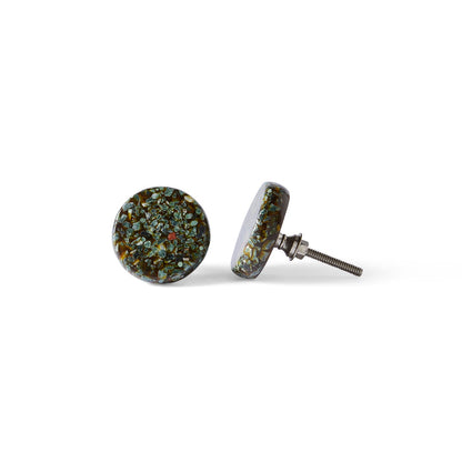 The Speckle Emerald Knob 4.5cm features a round design with a textured green and brown surface, resembling an emerald cabinet knob, set in metal with screw-back posts, shown on a white background.