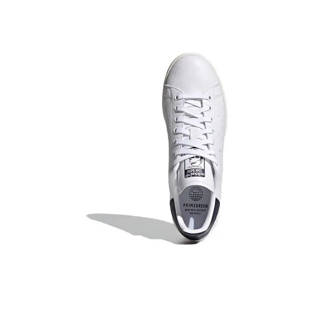 Adidas Stan Smith sneakers, white leather upper with lace-up front and navy detail