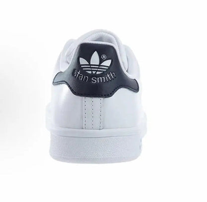 Adidas Stan Smith sneakers, white upper with dark blue heel tab and logo