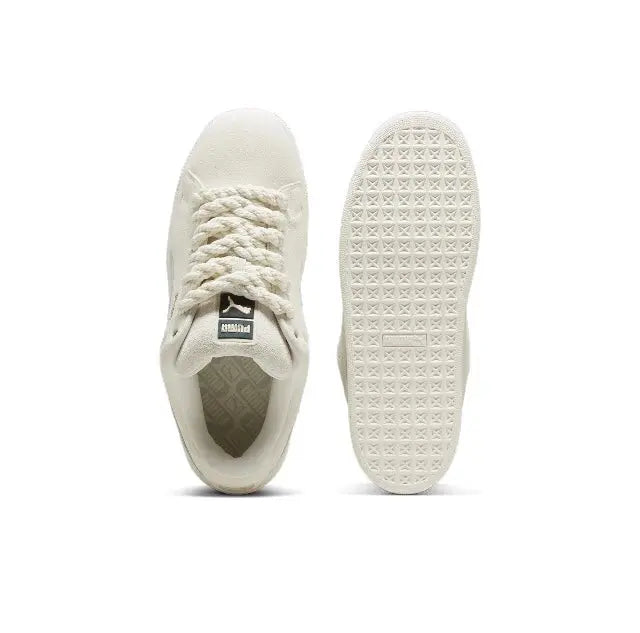 Puma suede sneaker heel and outsole view in light beige with treaded rubber sole