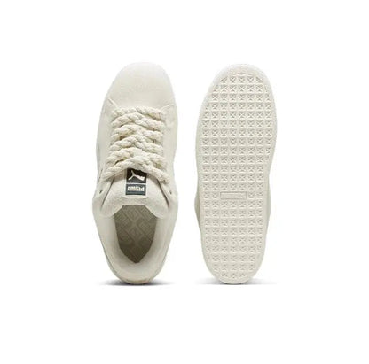 Puma suede sneaker heel and outsole view in light beige with treaded rubber sole
