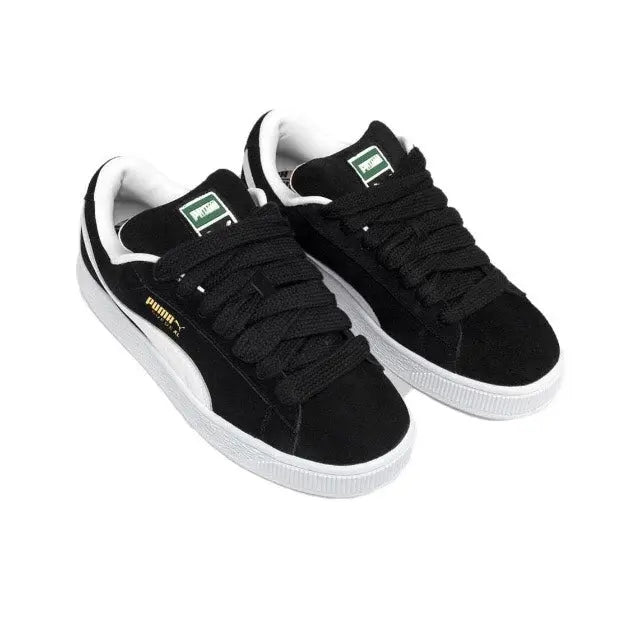 Puma Suede XL sneakers, black suede with green tongue label and white laces
