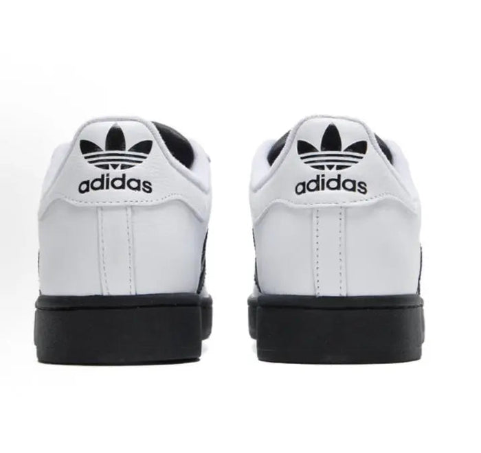 Adidas Superstar II sneaker heels in white with black outsole and adidas logo