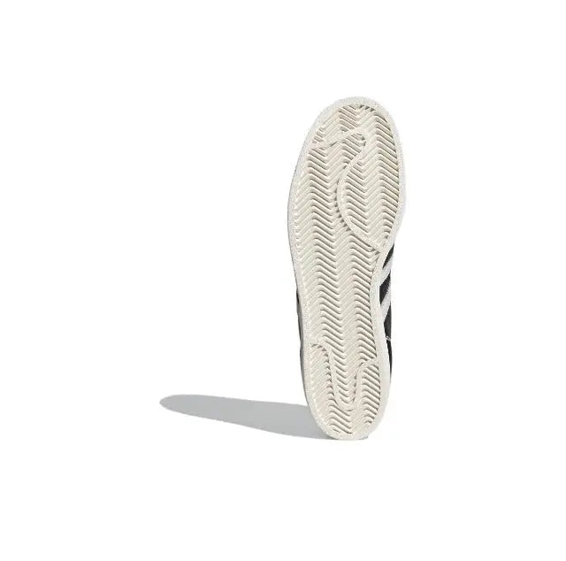 Adidas Superstar outsole, textured rubber tread on light beige sole