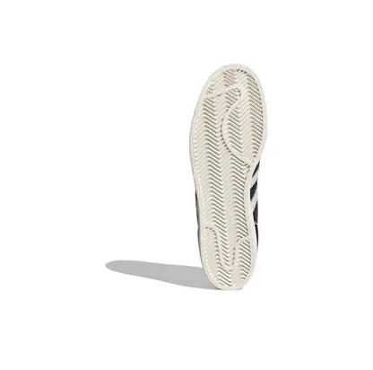 Adidas Superstar outsole, textured rubber tread on light beige sole