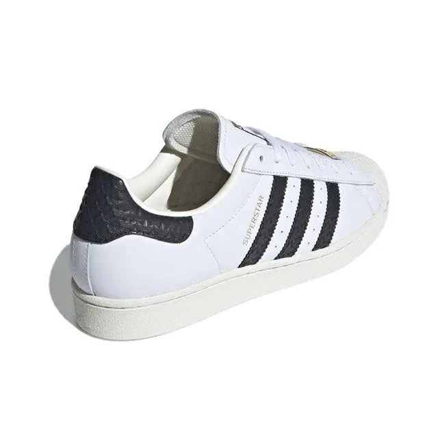 Adidas Superstar sneakers, white leather with black heel collar and side stripes