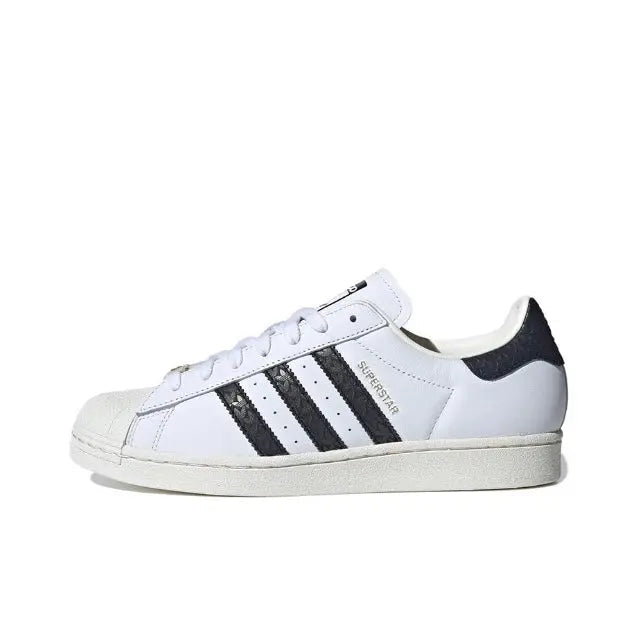 Adidas Superstar sneakers, white leather with side stripes and lace-up front