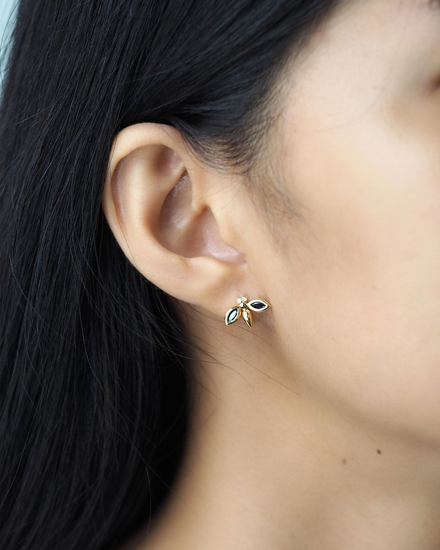 Simple Gold Bee Studs Accented With Montana Blue Stones