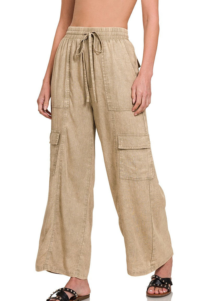 Tan linen-blend flowy cargo pants with elastic drawstring waist and wide legs