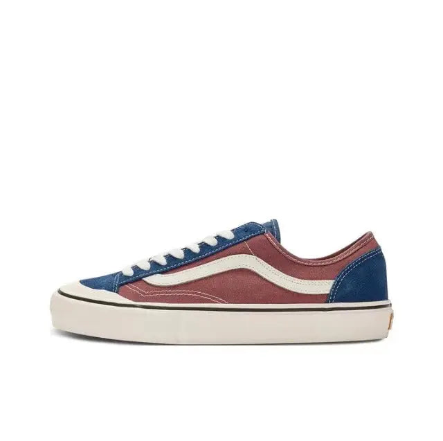 Low-top lace-up sneakers with maroon and navy canvas panels, cream trim, white sole