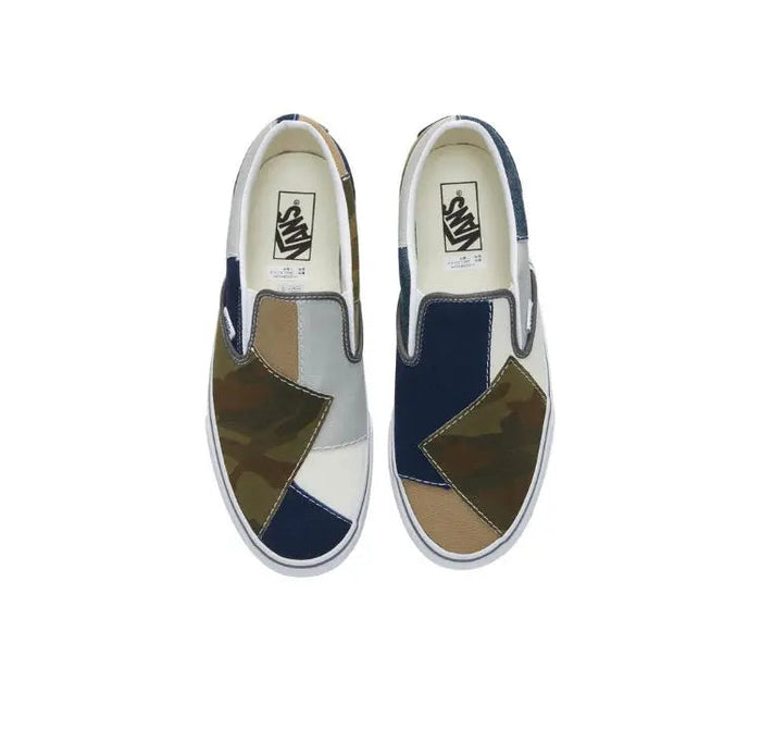 Slip-on sneakers pair, navy and olive patchwork uppers with white logo heel labels