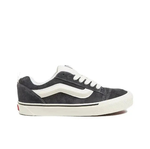 Vans Knu Skool low-top sneakers with dark navy uppers, white side stripe, white sole