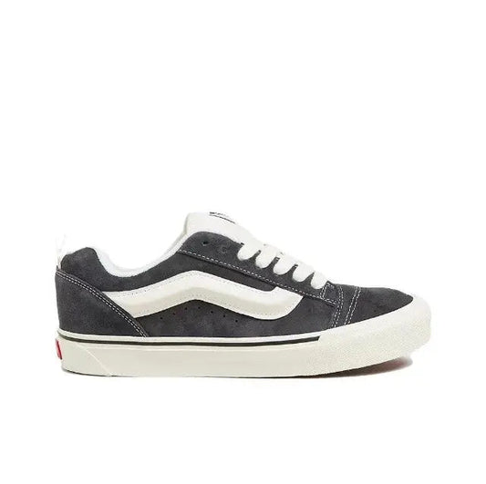 Vans Knu Skool low-top sneakers with dark navy uppers, white side stripe, white sole