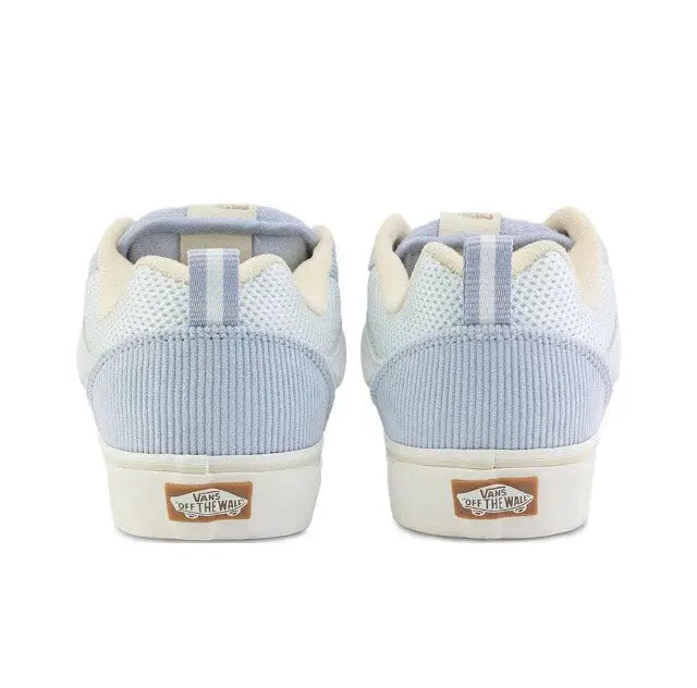 Knu Skool sneaker heel and collar view, light blue ribbed panels, cream sole