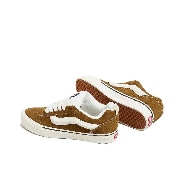 Brown suede Knu Skool low-top sneakers, back view with white stripe and white sole