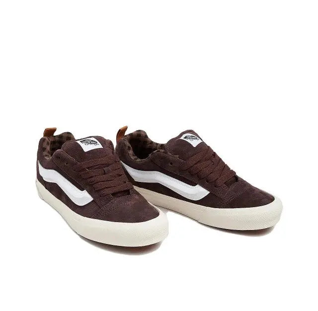 Brown Vans Knu Skool sneakers with white side stripes and lace-up
