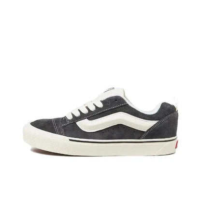 Vans Knu Skool low-top sneakers; dark suede upper, white lace panel, white sole