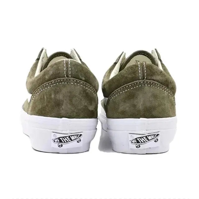 Vans Old Skool low-top skate shoes, olive suede heels with white sole and Vans label