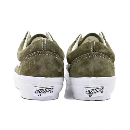 Vans Old Skool low-top skate shoes, olive suede heels with white sole and Vans label