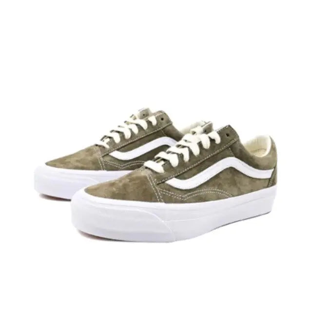 Vans Old Skool low-top skate shoes pair in olive suede with white stripe and lace-up