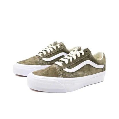 Vans Old Skool low-top skate shoes pair in olive suede with white stripe and lace-up