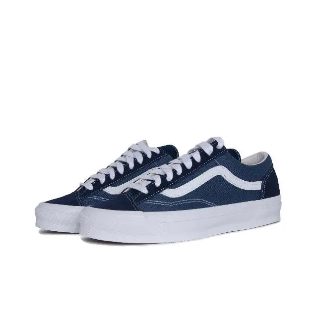 Vans Old Skool Vault low-top sneakers, white midsole with navy stripes and lace-up uppers
