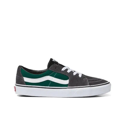 Low-top skate shoe in black with green-and-white stripe, white rubber sole and laces