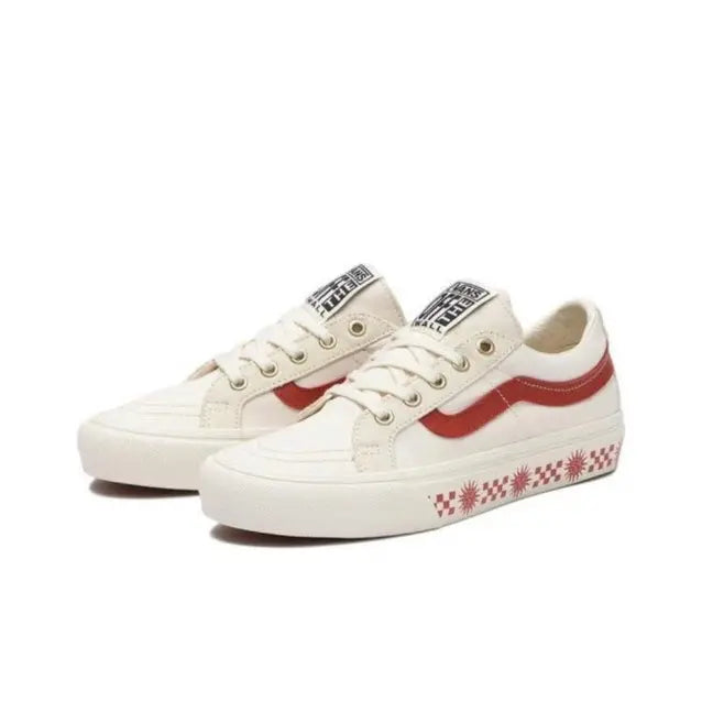 Vans SK8-Low low-top sneakers pair in white with red stripe and patterned side