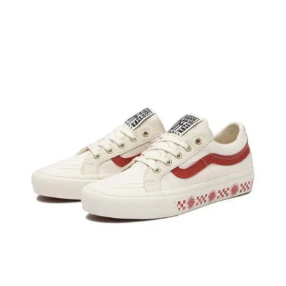 Vans SK8-Low low-top sneakers pair in white with red stripe and patterned side